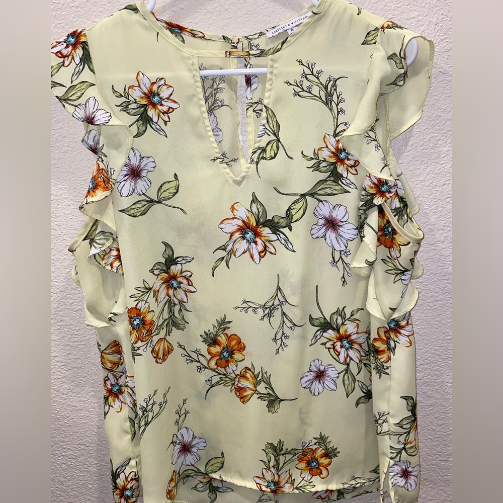 Light yellow flowy blouse